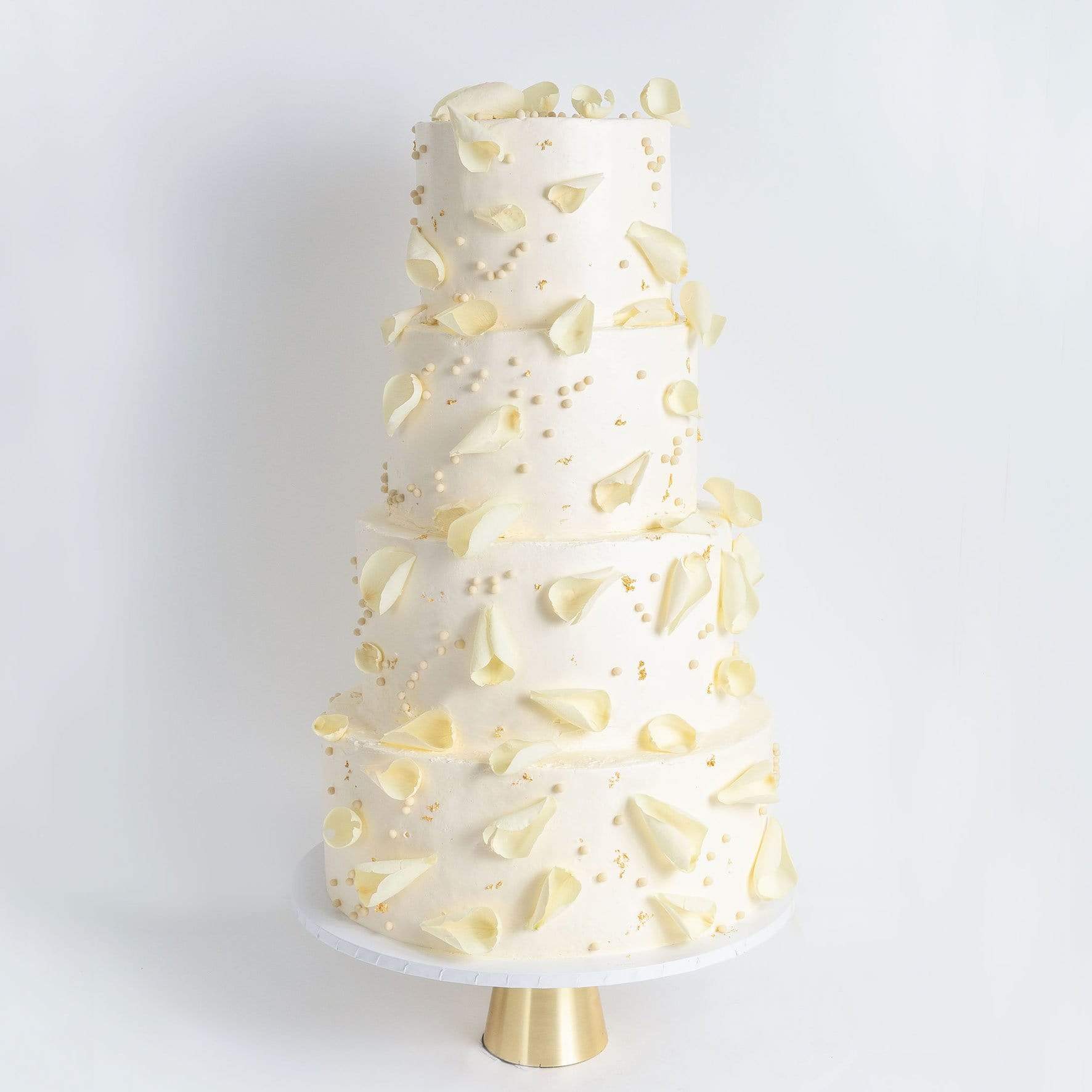 Four Tier Petals And Gold Wedding Cake