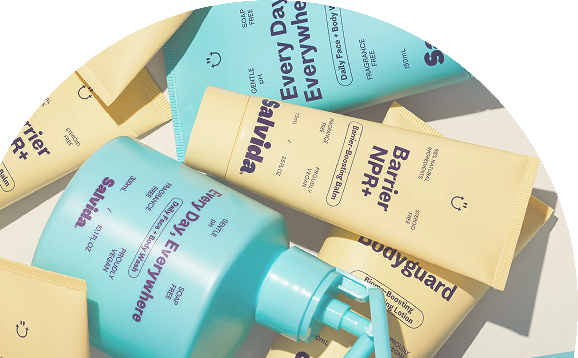 Assorted skincare products in pastel yellow and blue packaging.