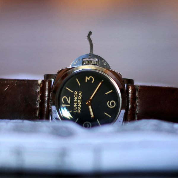 panerai 372 watch on a vintage swiss ammo pouch watch band