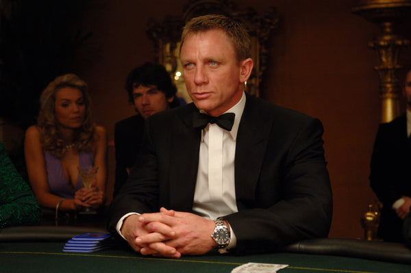 daniel craig 007 james bond with omega seamaster watch at poker table