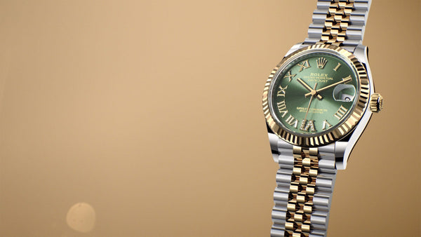 rolex datejust two tone watch and green dial