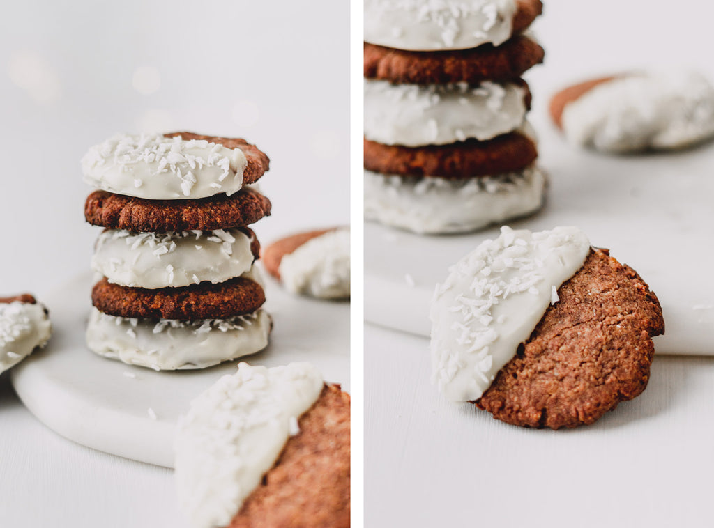 composite image: left image shows 5 macadamia cookies stacked on top of one another, on white backdrop with twinkle lights in background. Right image shows a close up of one macadamia nut cookie dipped in white chocolate