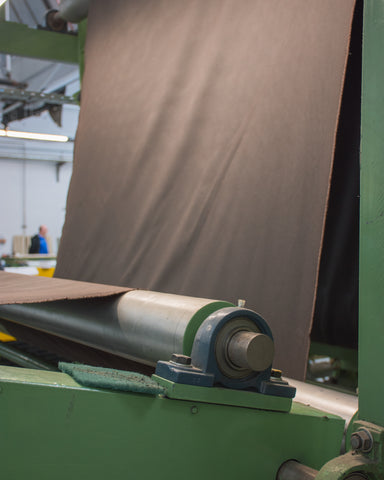 Image shows waxed cotton being produced at Halley Stevensons in Dundee.