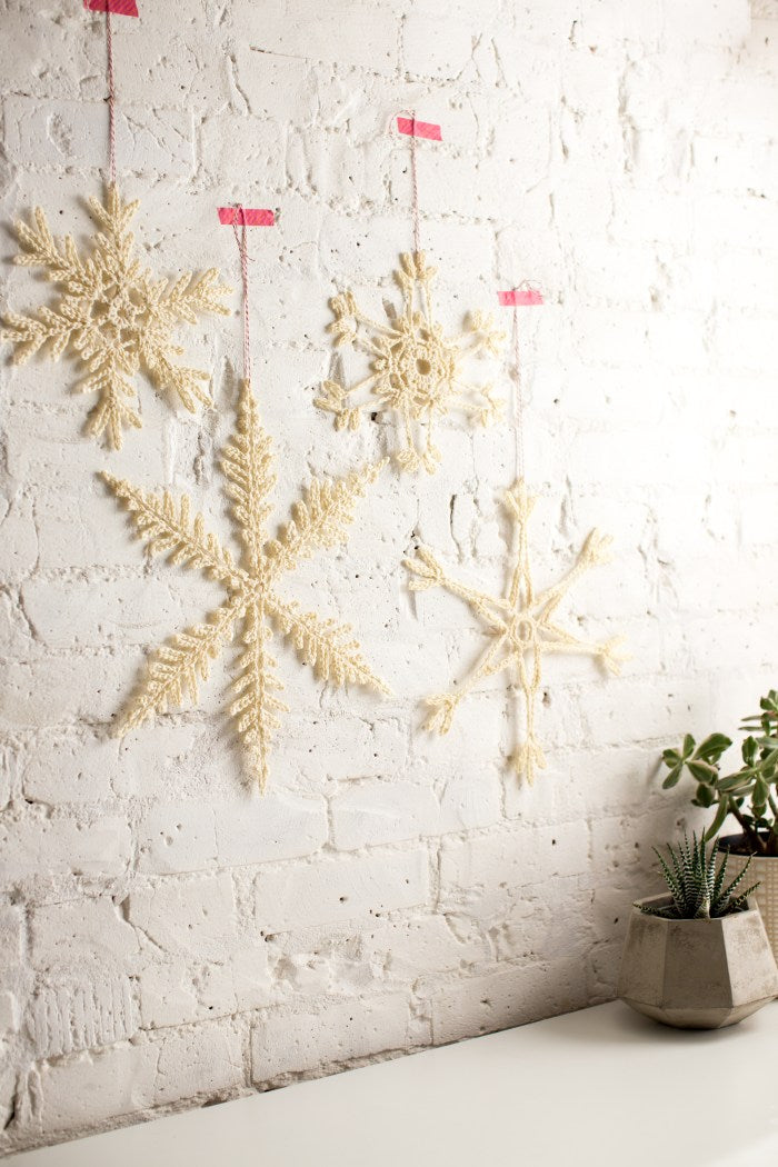 Giant Crocheted Snowflakes by Anne Weil of Flax & Twine