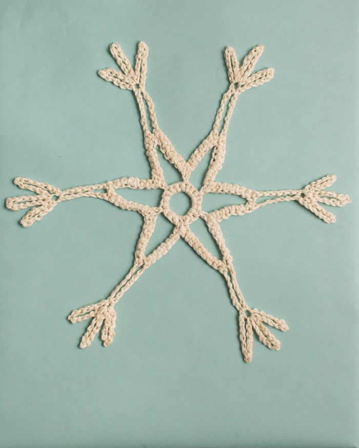 Giant Crocheted Snowflakes by Anne Weil of Flax & Twine