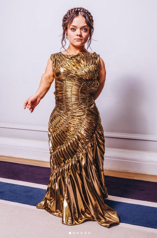 fran mills witcher gold fossil dress georgia hardinge premiere london pleated gown