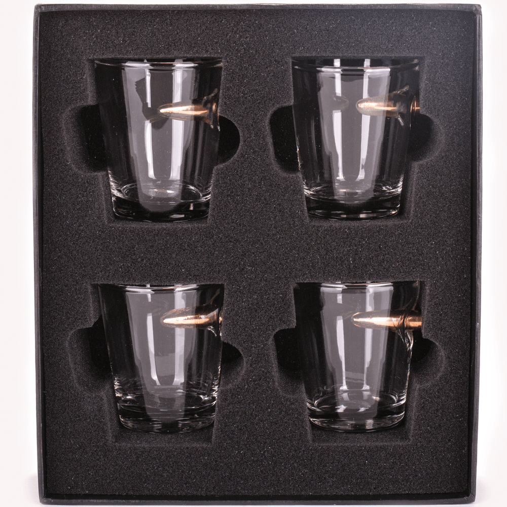 shot glasses with bullets in them