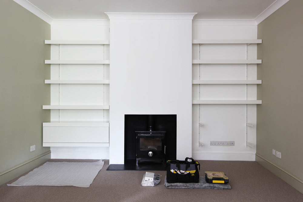 wall cabinets fitted onto alcove shelving