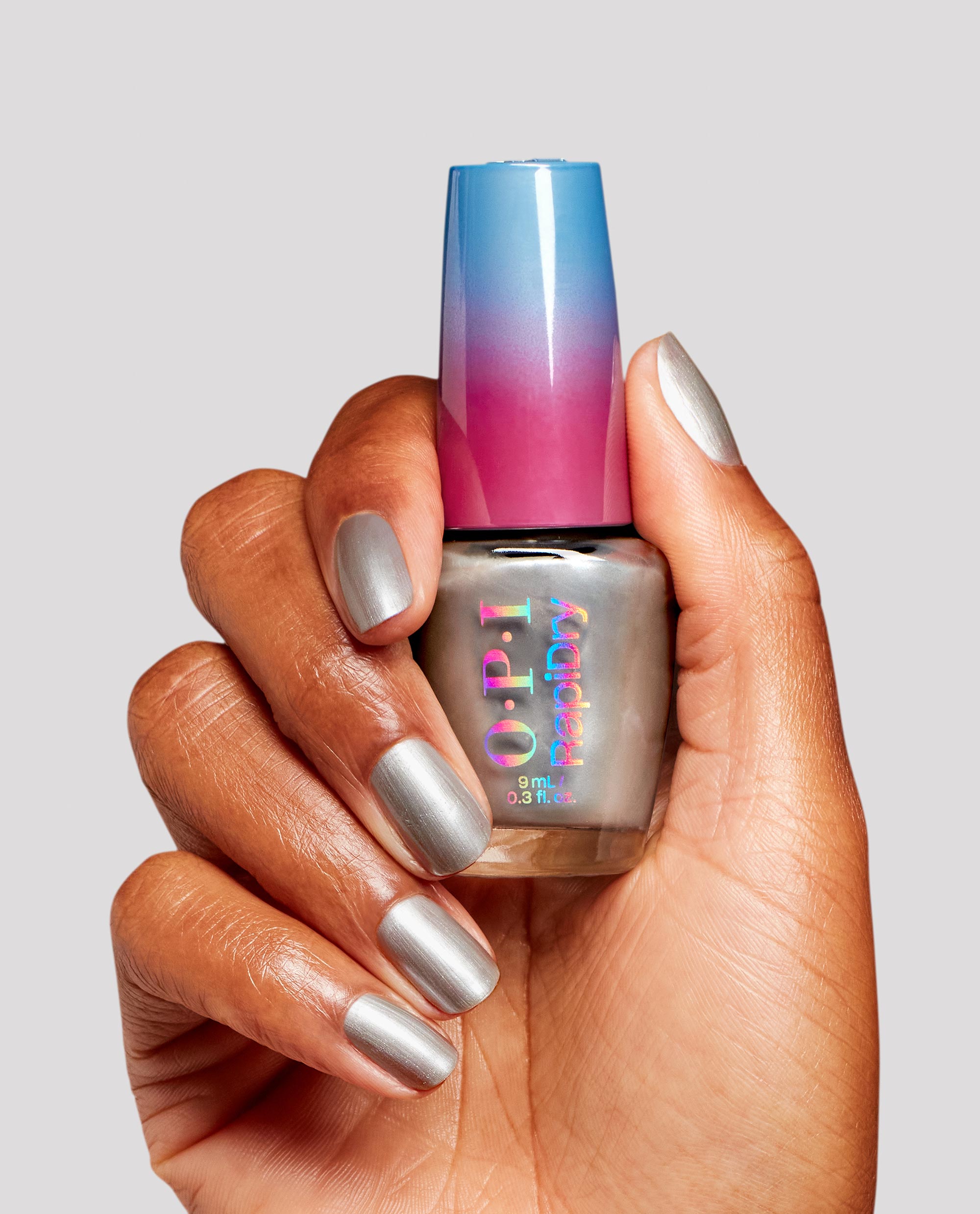 OPI A Silver of A Sec RapiDry Quick-Dry Nail Polish Hand and Bottle