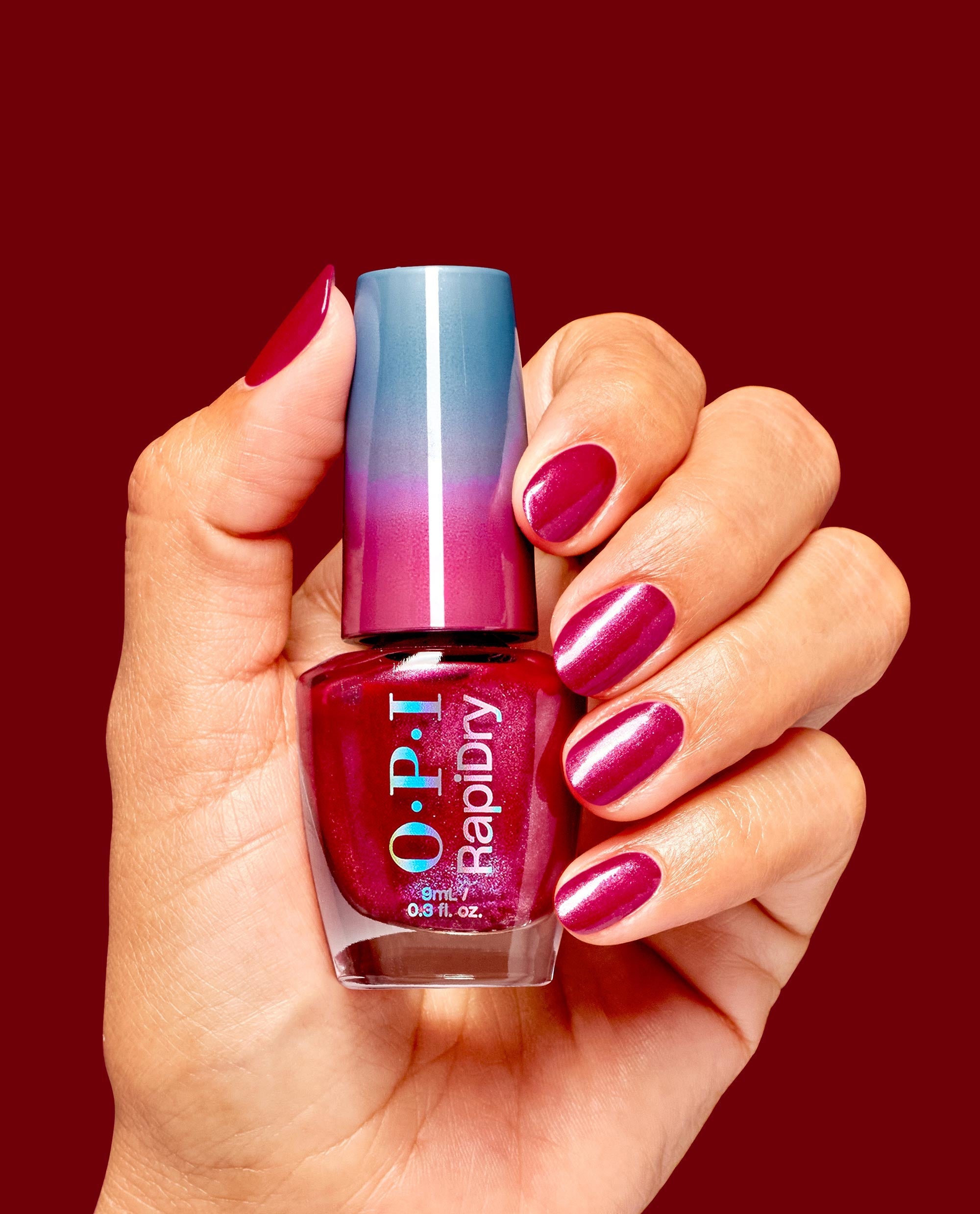 OPI Ring the Alarm RapiDry Quick-Dry Nail Polish Hand and Bottle