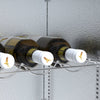 Interior shot of Borrelli's bar fridge wine rack, filled with bottles, highlighting convenient storage solutions for wine connoisseurs in hospitality.