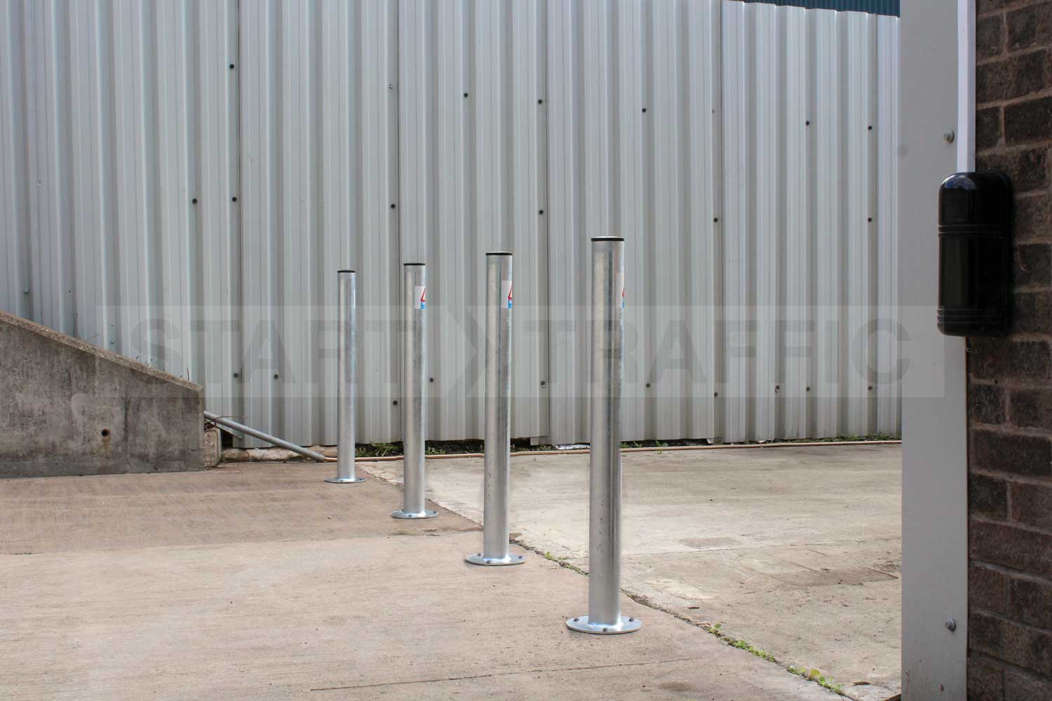 750mm glavanised bolt down bollards in situ