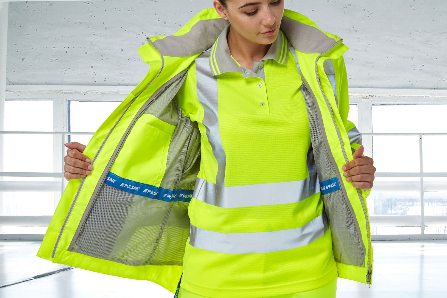 Ladies Hi Vis Polo Shirt Under A Storm Jacket