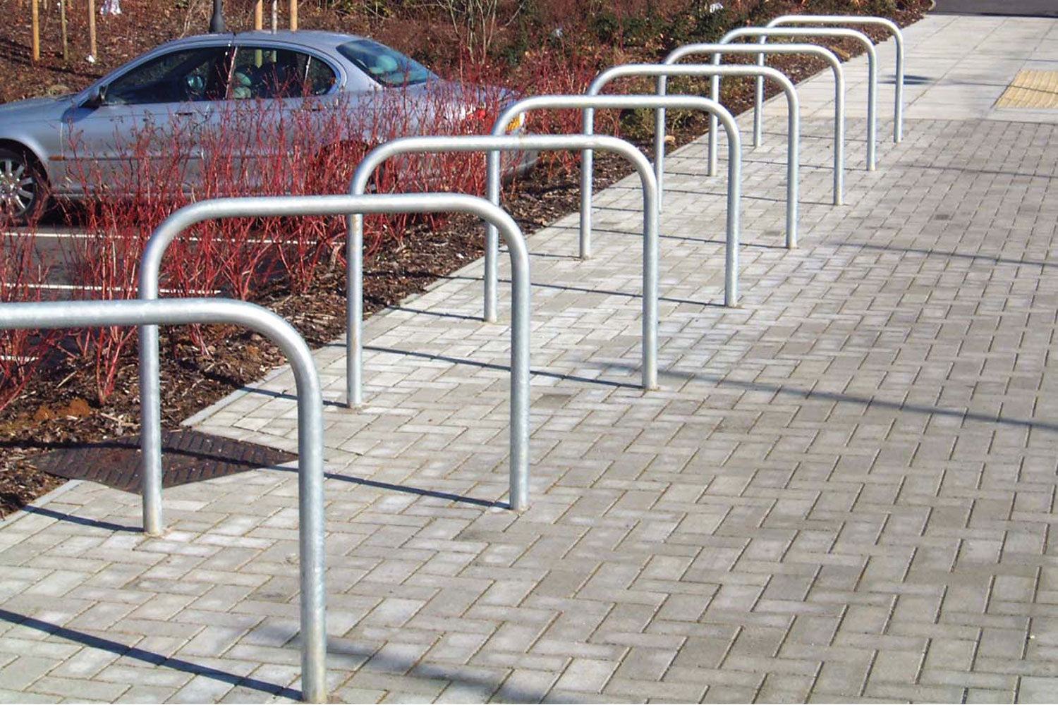 Sheffield cycle stand installed into block paving