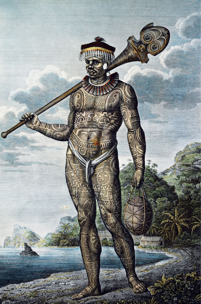 A man from the island of Nukua Hiva, his body covered in tattoos