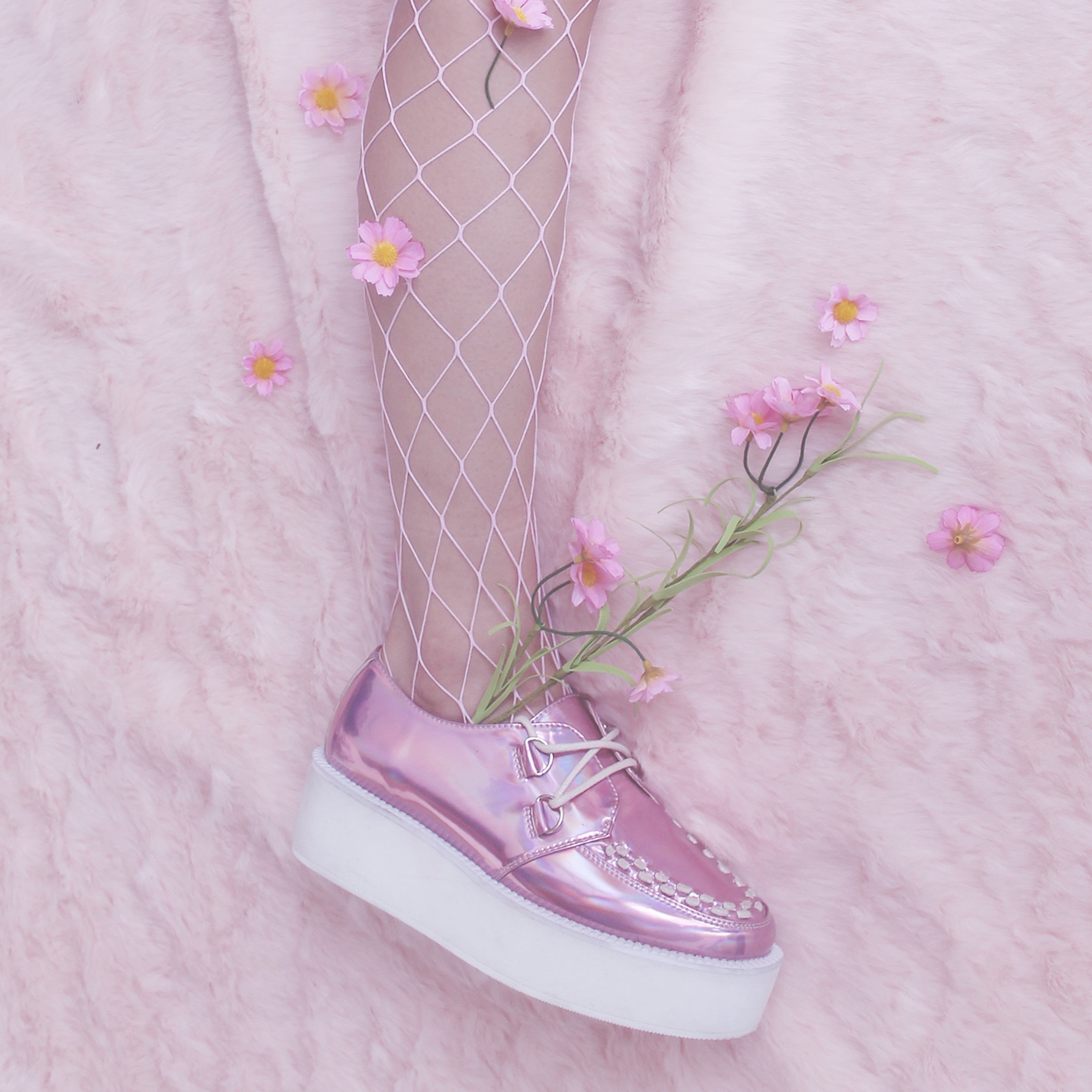 baby pink fishnet stockings