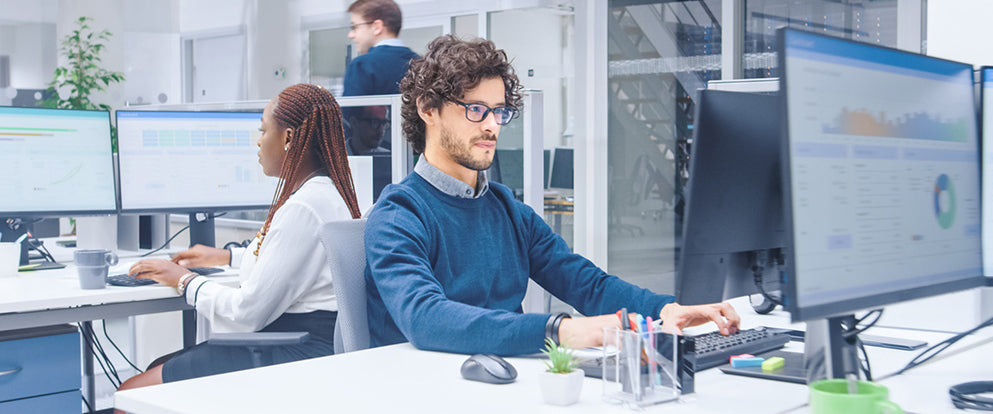 Man working on a computer in a modern office