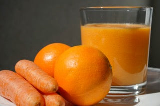 carrot-orange-fruit-juice-on-clear-glass-bowl