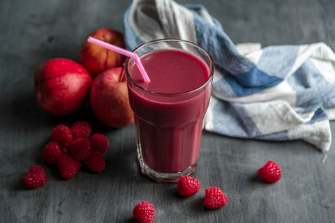 strawberry-juice-beside-strawberry-fruits