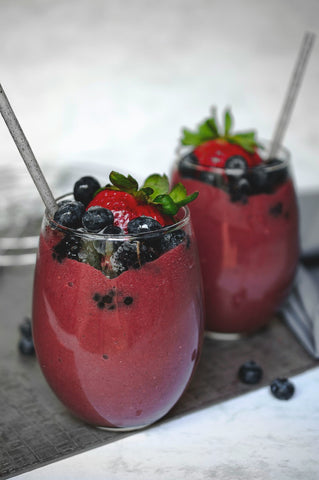 two-fruit-shake-on-glasses-blueberries-strawberries