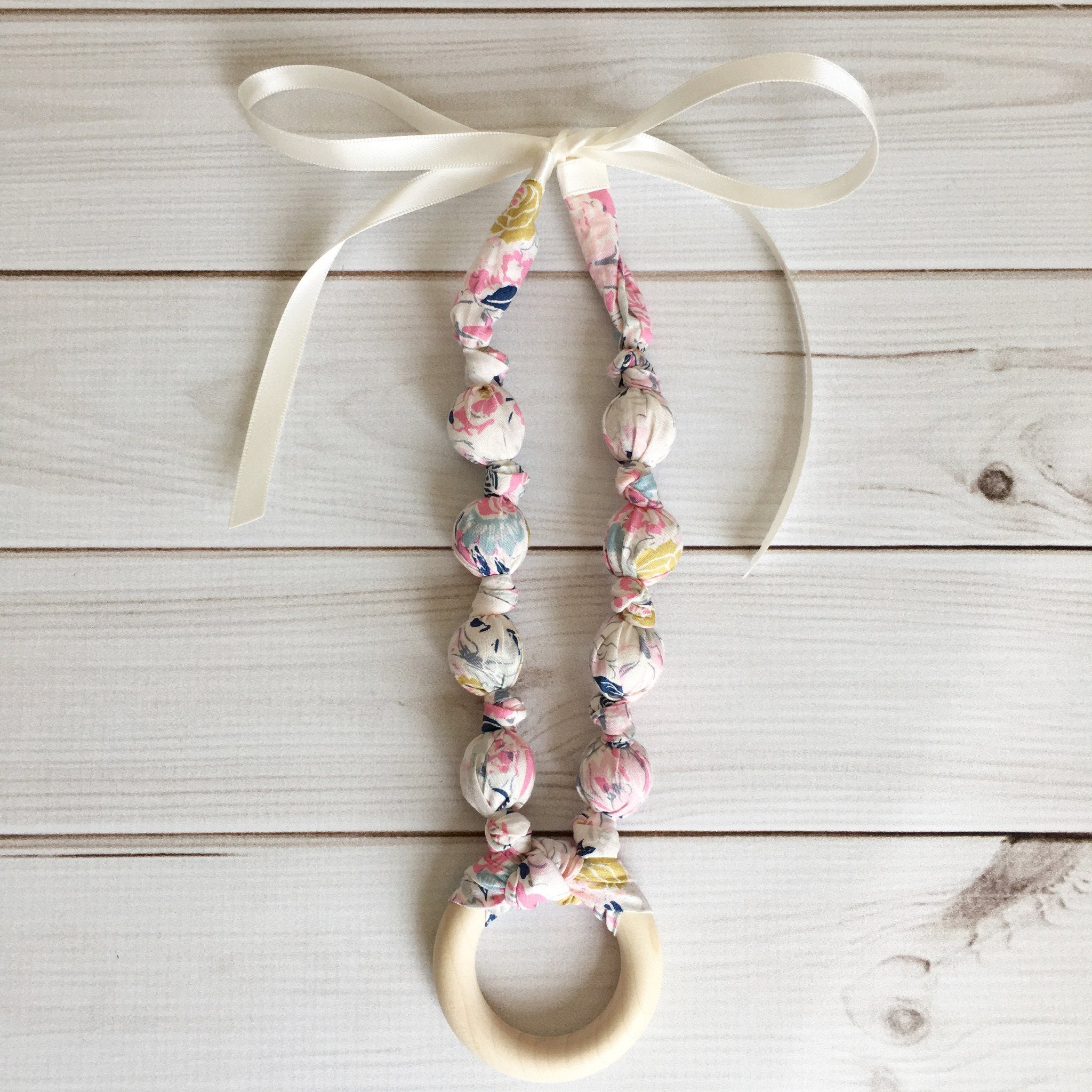 baby boy shower gift: teething necklace