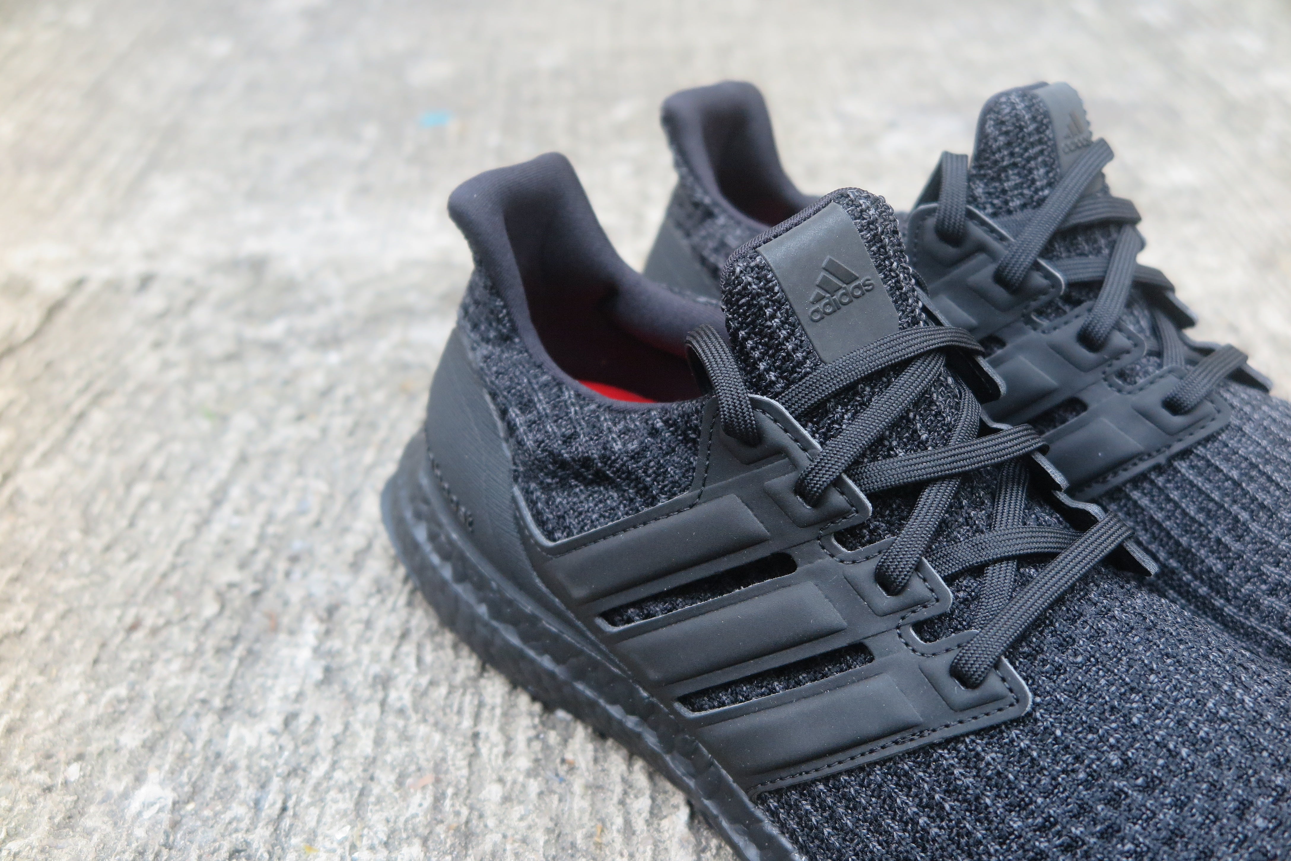 ultra boost 4. triple black active red