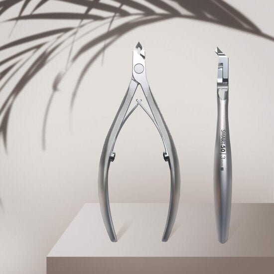 https://cdn.shopify.com/s/files/1/0862/2342/1777/files/staleks-professionele-nagelriem-tang-smart-50-3mm-222380.jpg?v=1730166205