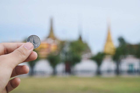 1-baht coin. Photo Credit @RatiButr