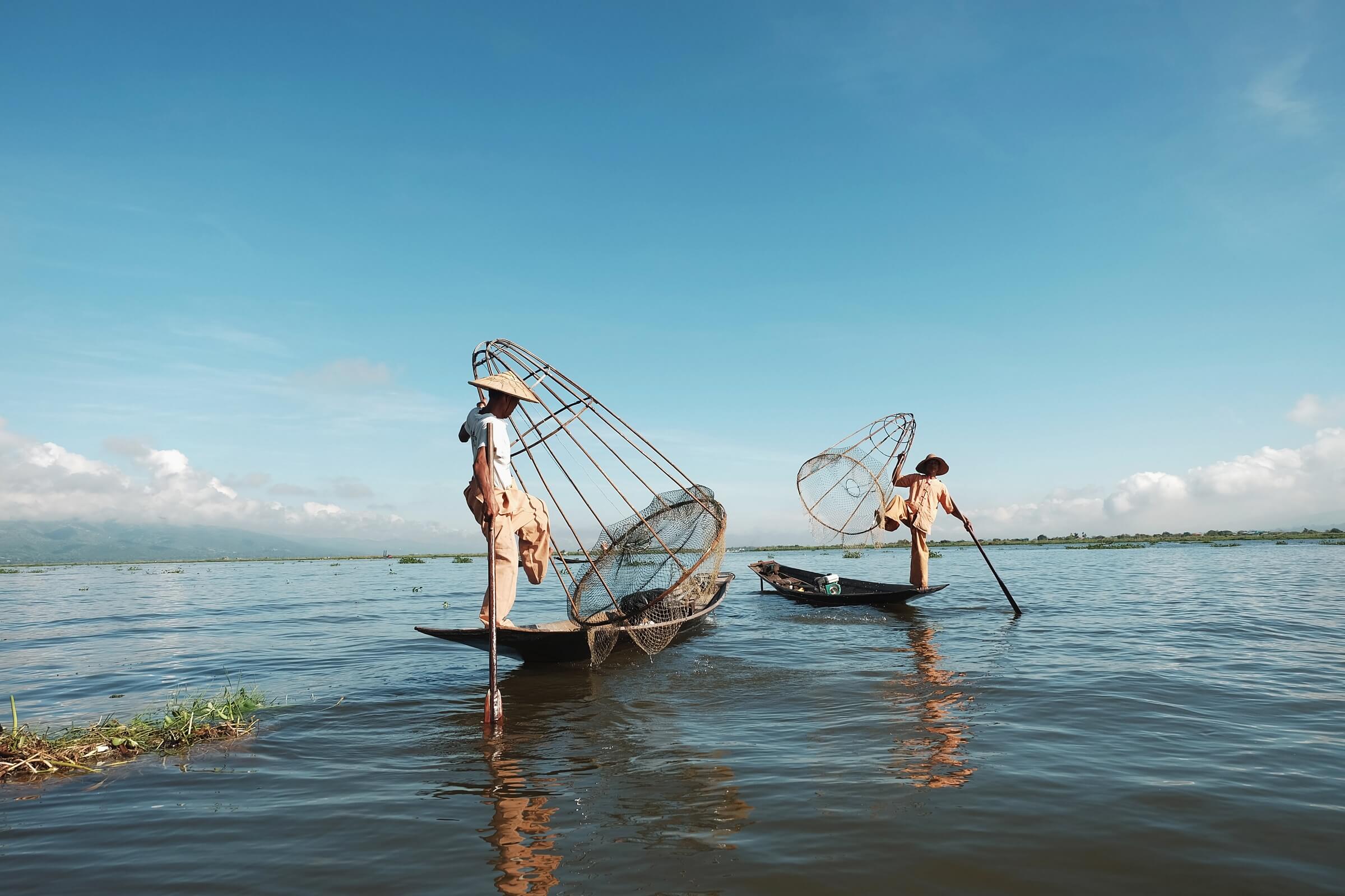 Thai Fishermen wearing traditional pants