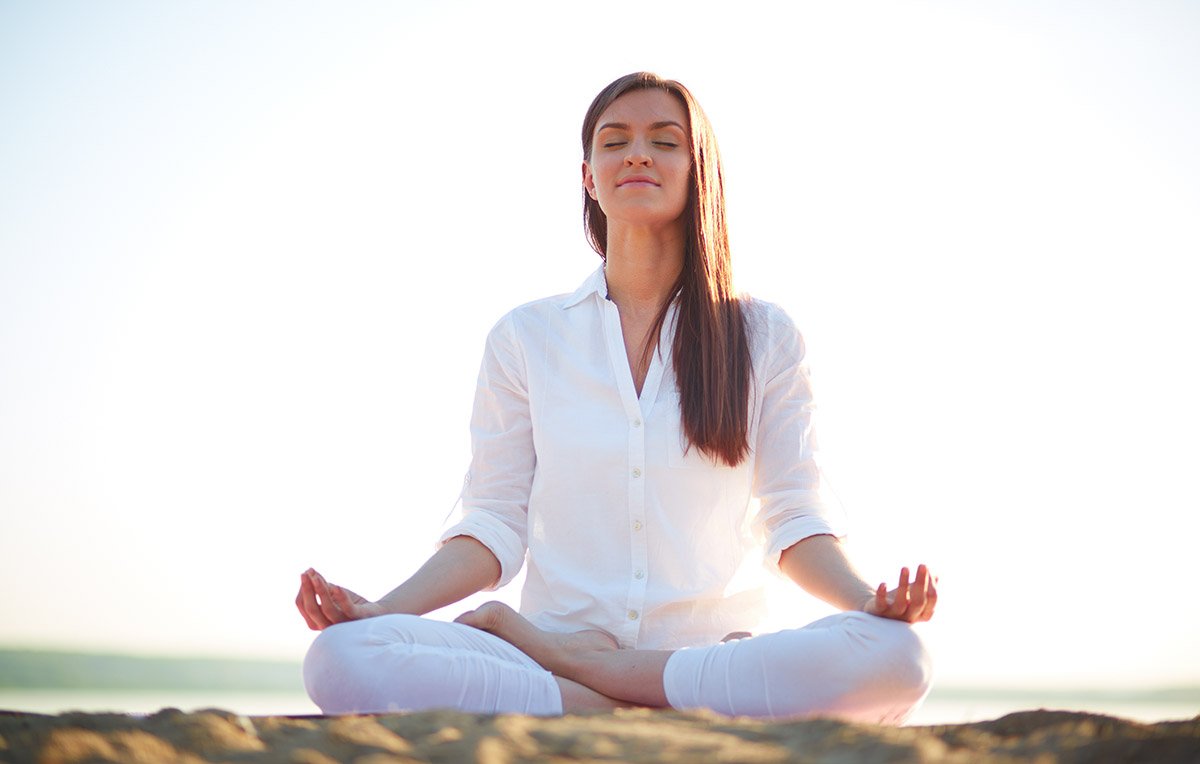 Meditation pose in white clothes