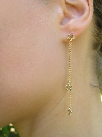 long flower earrings gold