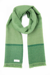 The Little Tibet Green Cashmere Handloom Muffler folded as a Scarf