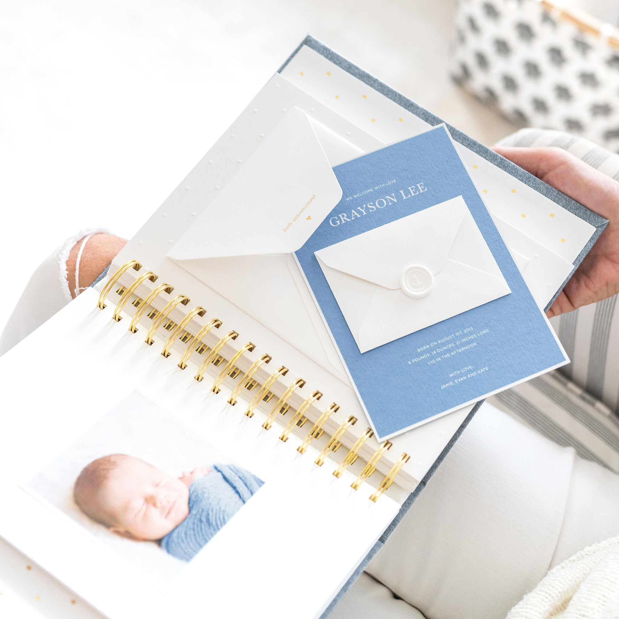 Open baby book with birth announcement