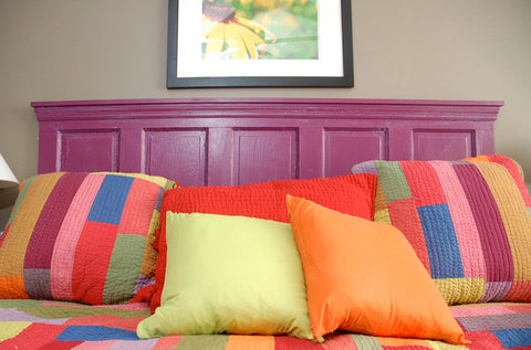 finished purple shaker door used as headboard