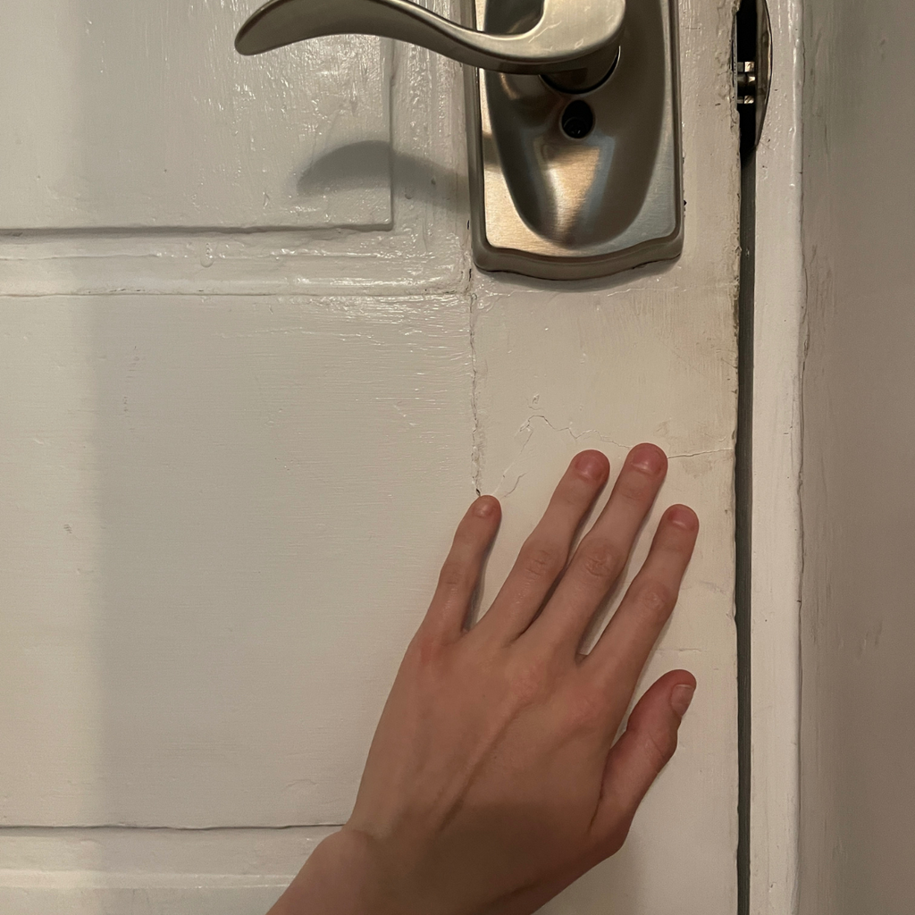 white door checking insulation and draft