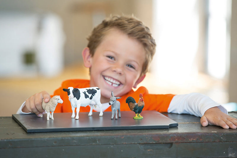 schleich cow family on the pasture