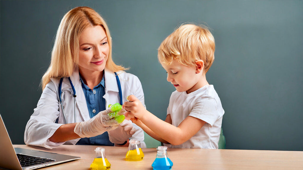 A child therapist working with a child using slime as a means of therapy.