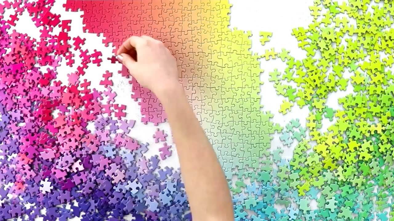Gradient jigsaw puzzle being built.