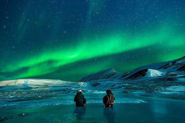 people watching northern lights