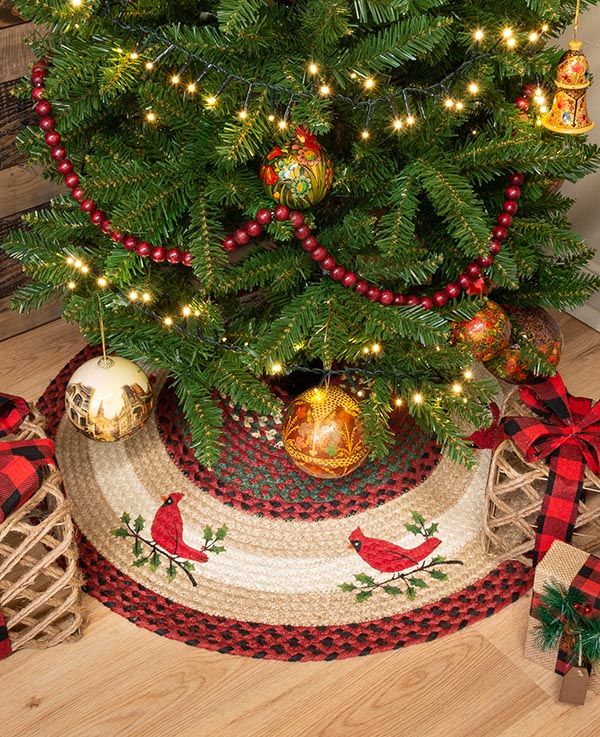 Tree skirt with holly cardinal design