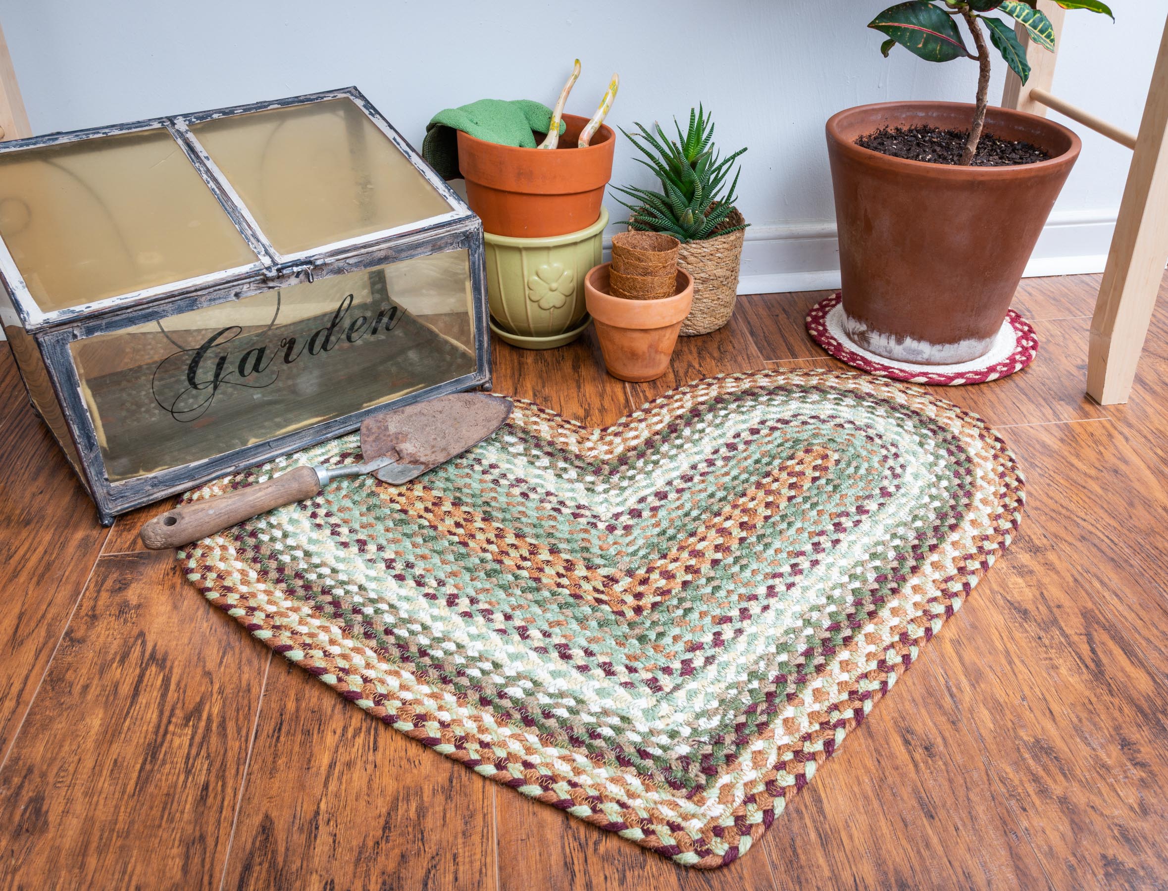 Heart-shaped braided rug 