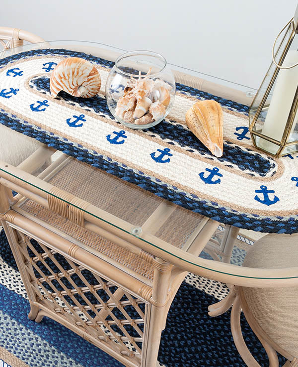 Nautical anchor table runner with sea shell center piece