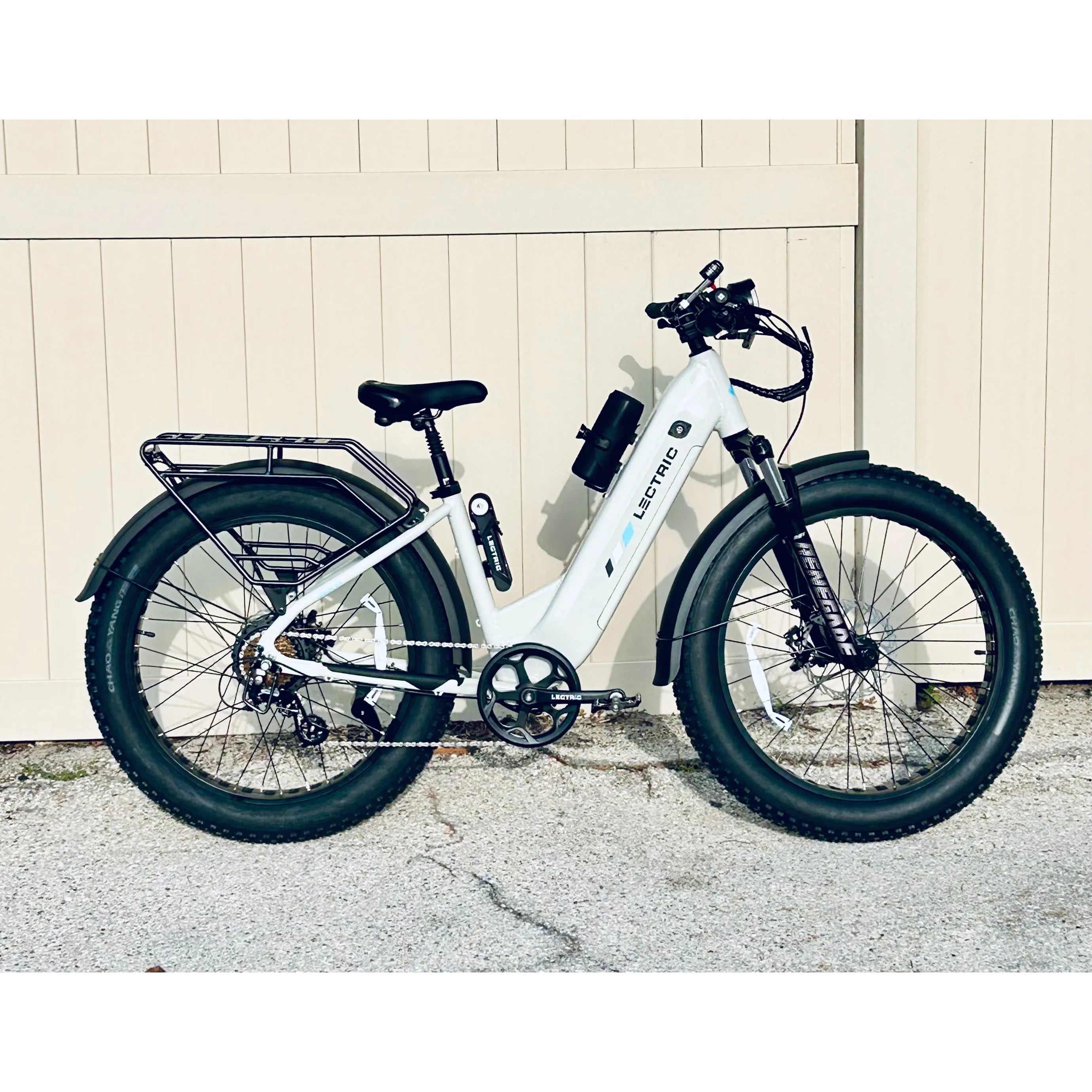 Lectric XPeak 2.0 parked in front of a fence in Fort Myers Beach.