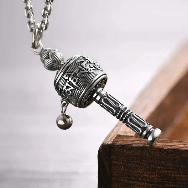 Collana con ciondolo a forma di ruota di preghiera tibetana - Om Mani Padme Hum