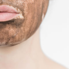 clay mask on face
