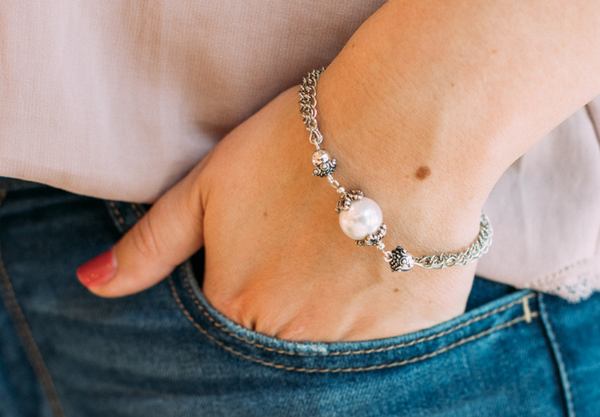 Best Boxing Day Jewelry Sale 2020- a Carolily Finery bracelet made from antiqued silver chain and a Swarovski crystal pearl