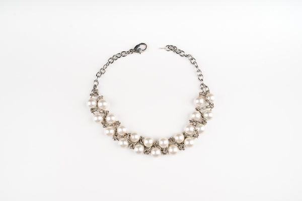 A buyer's guide to pearls- a Carolily Finery statement necklace made from white Swarovski crystal pearls