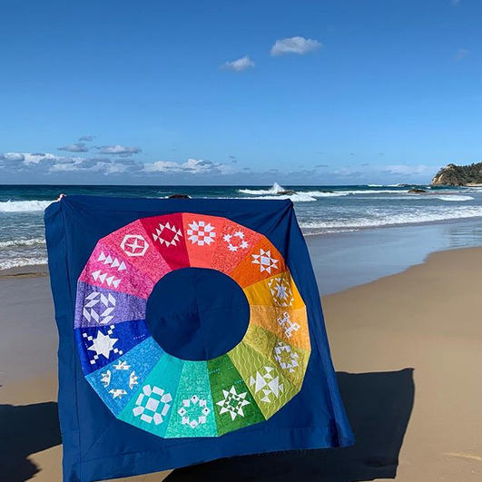 A rainbow foundation paper pieced quilt pattern