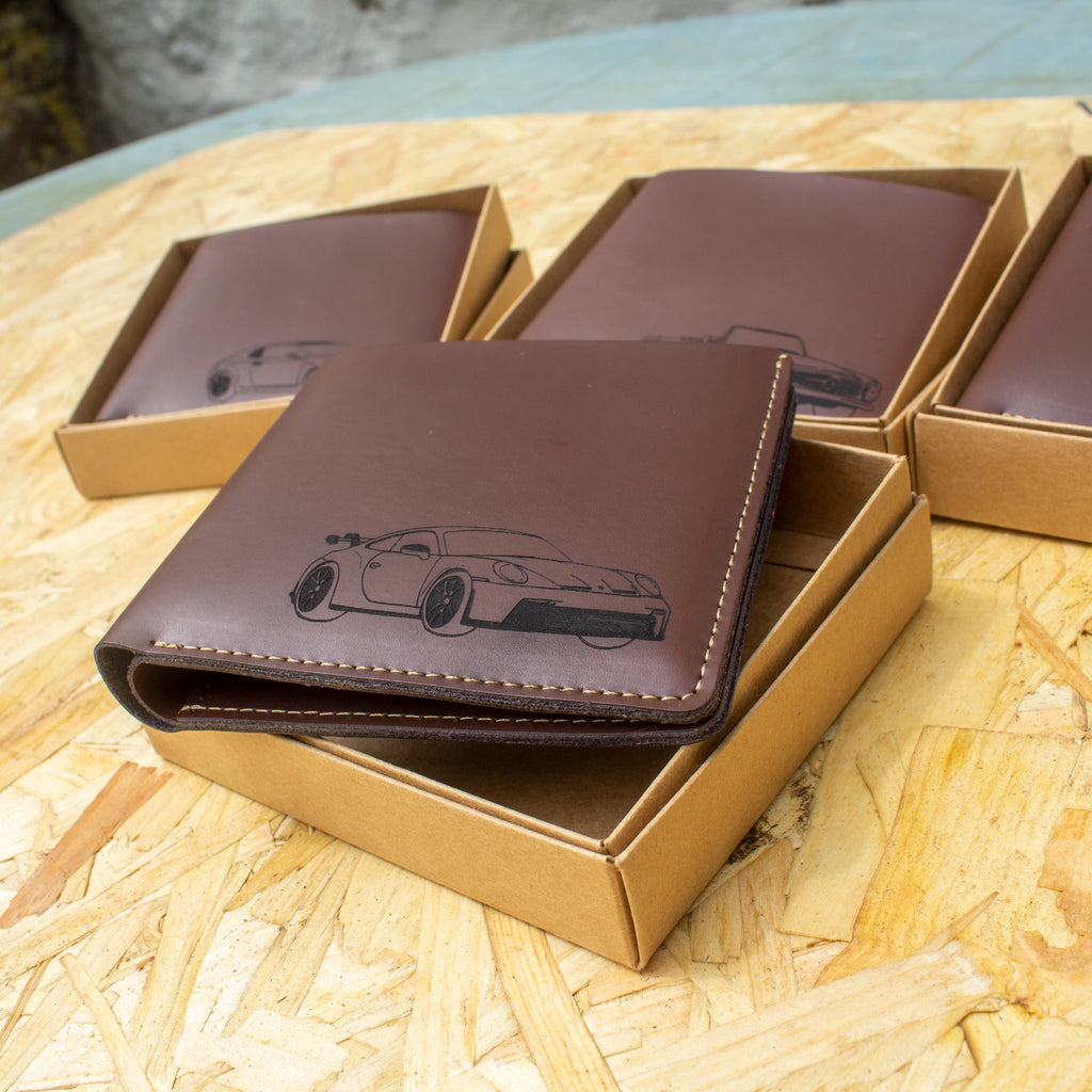 Engraved leather wallet featuring an engraved drawing of your car by your life in cars  