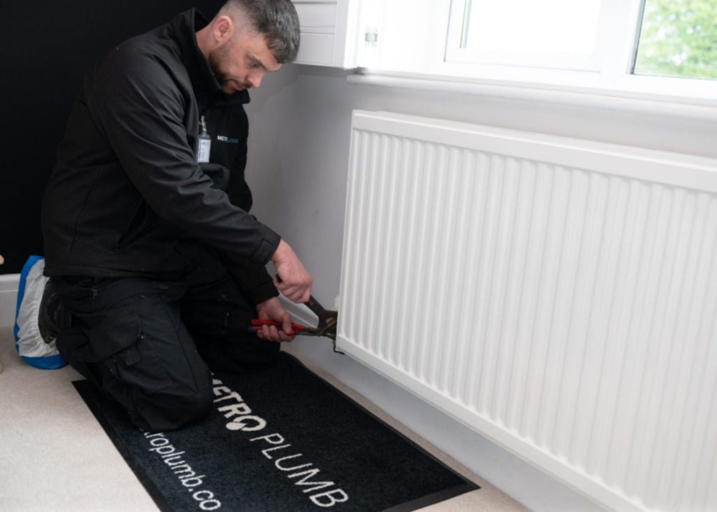 Logo mat by radiator